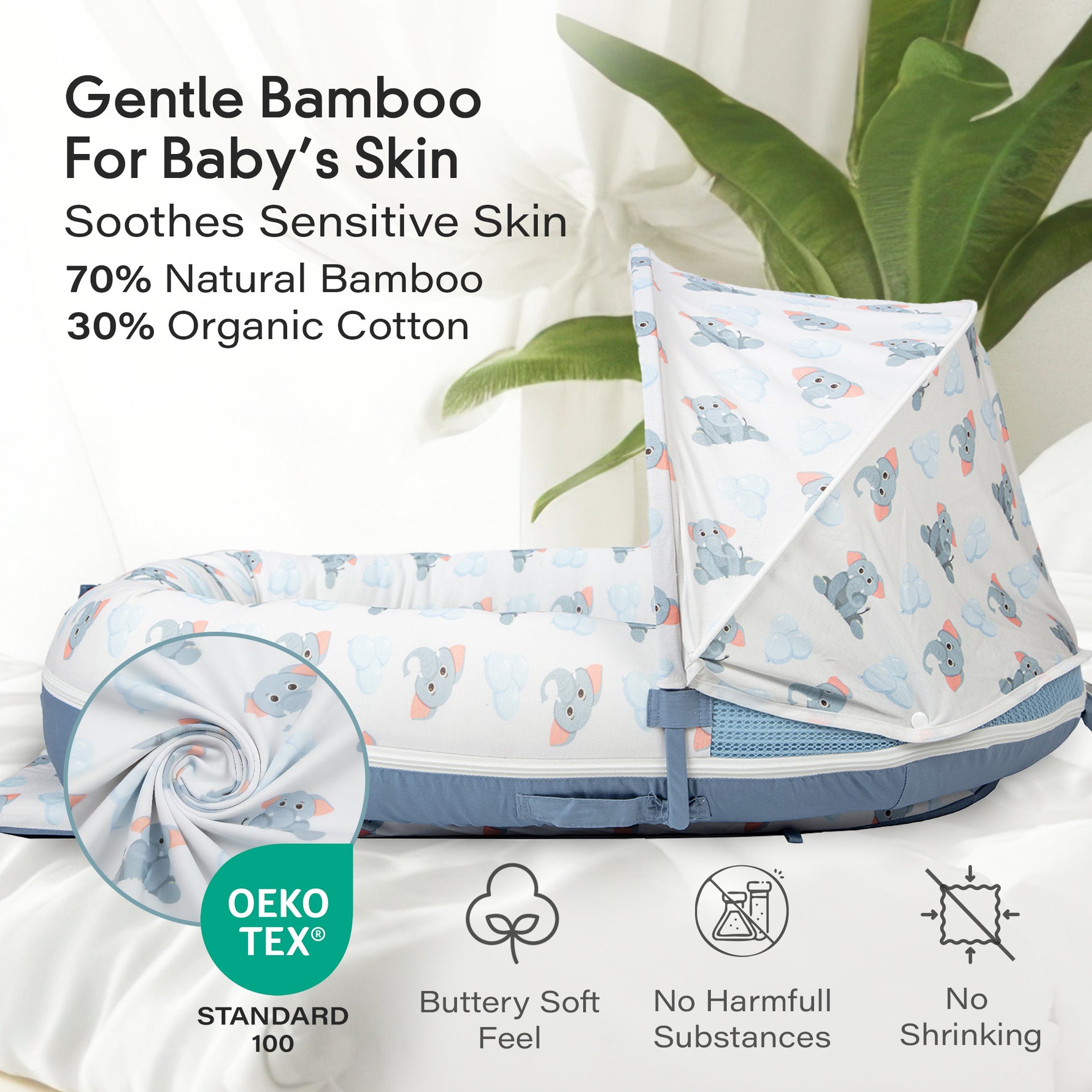 JollyBoo blue elephant infant lounger close up showing bambooviscose and cotton fabric with OEKO-TEX certification