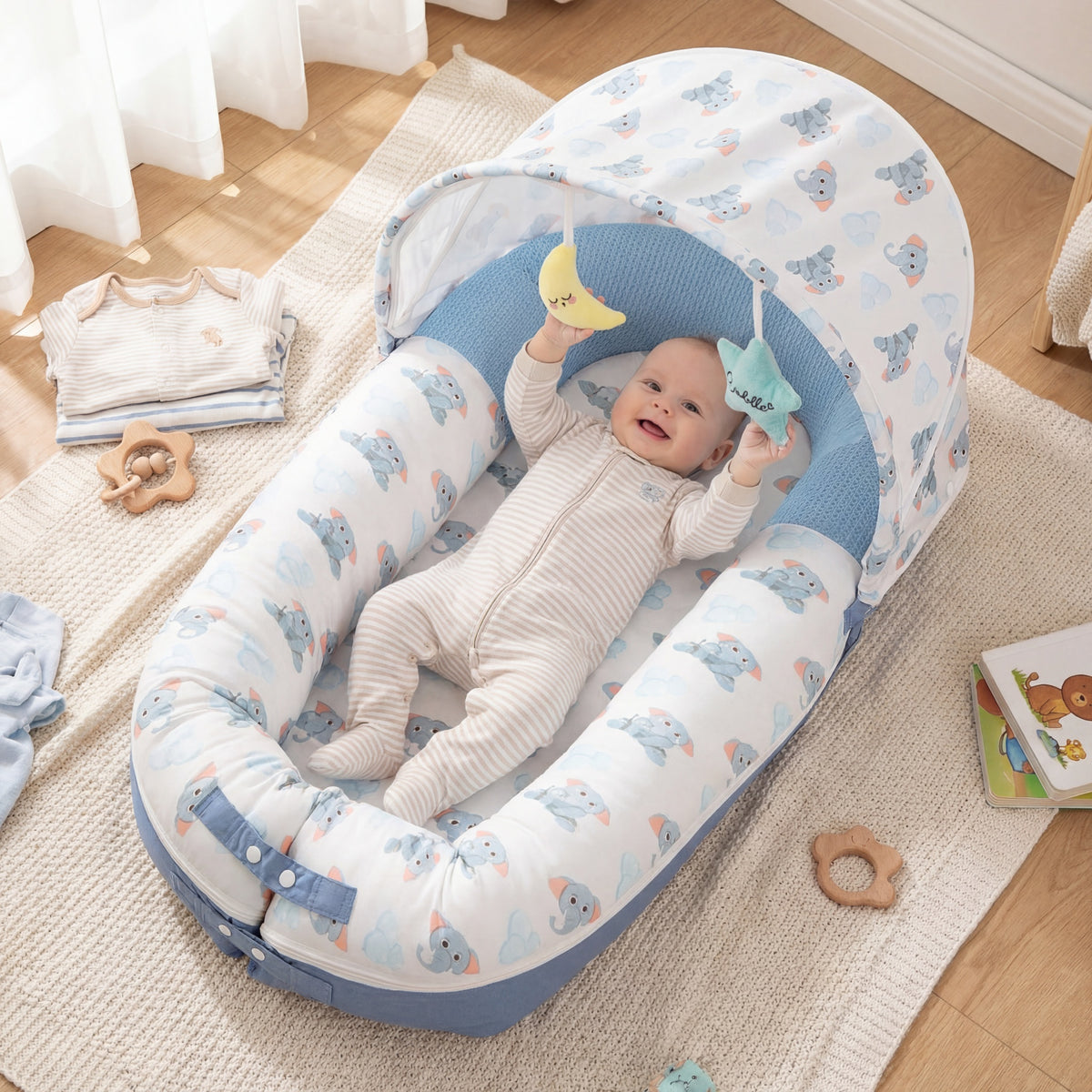 Newborn baby in portable infant lounger with removable cover